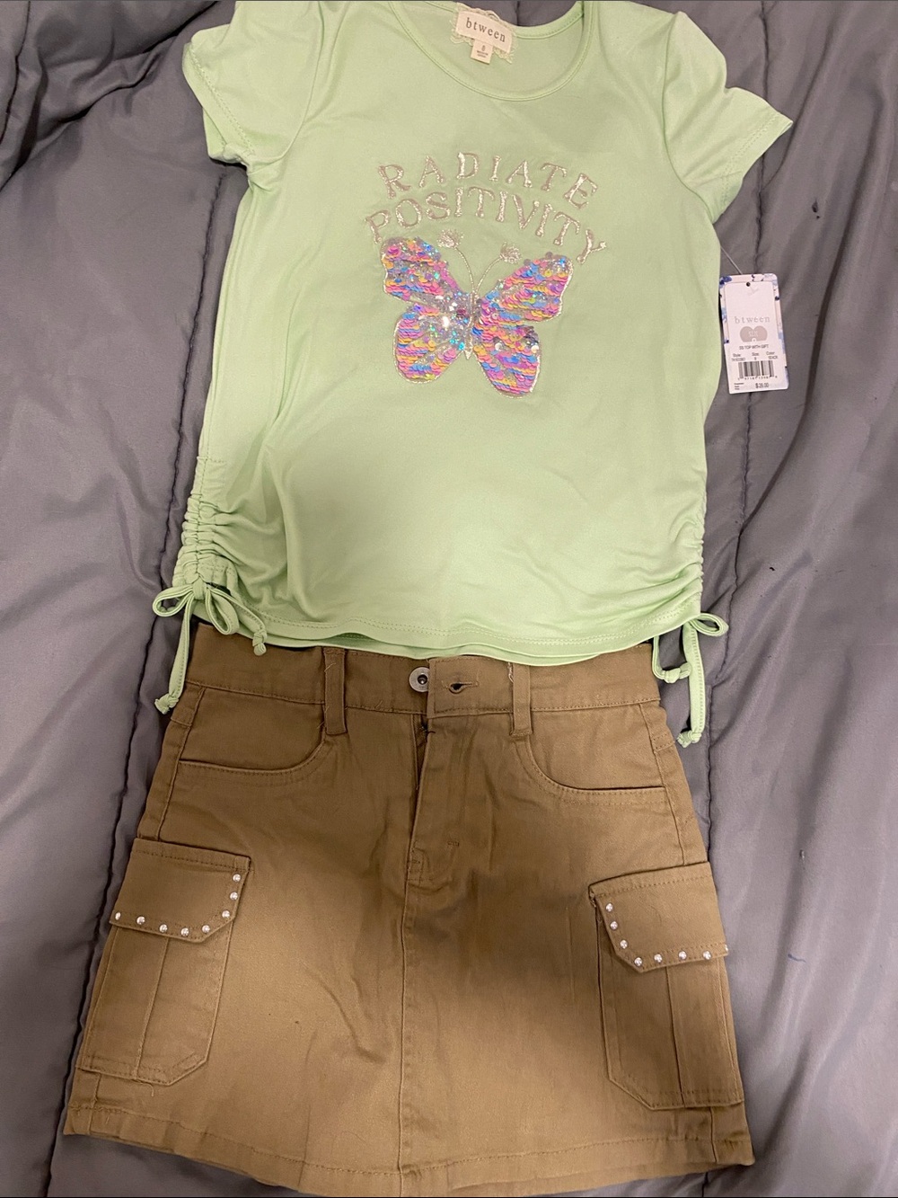 SET 2 items.  Kids cargo skorts and brand new butterfly RADIATE POSITIVITY